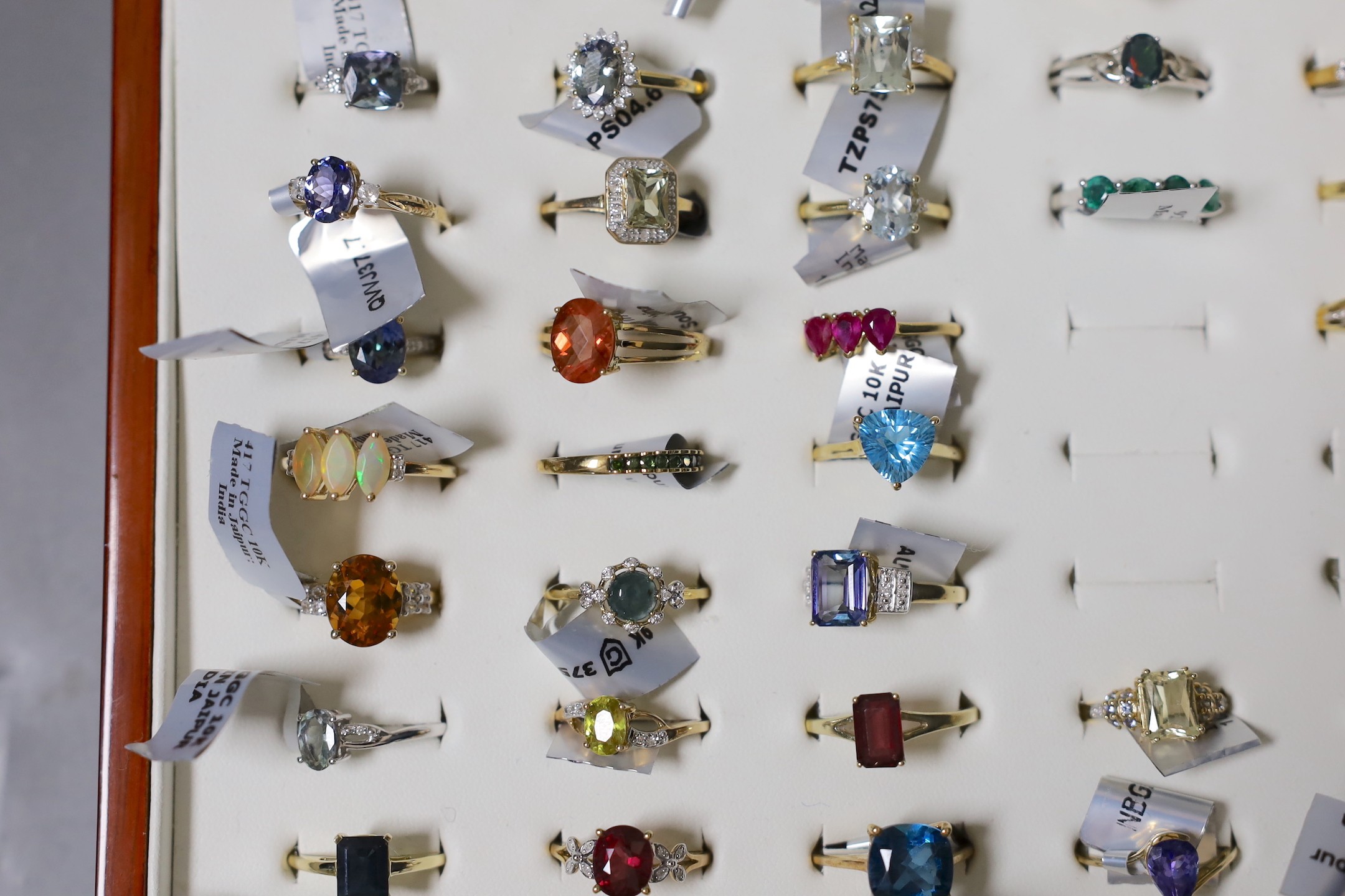 A collection of thirty four modern 9ct gold and gem set dress rings, four similar 18ct gold and gem set rings, four 14ct gold and gem set rings and three 925 rings.